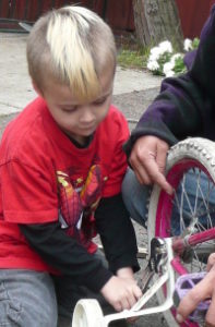 anthony fixing a bike
